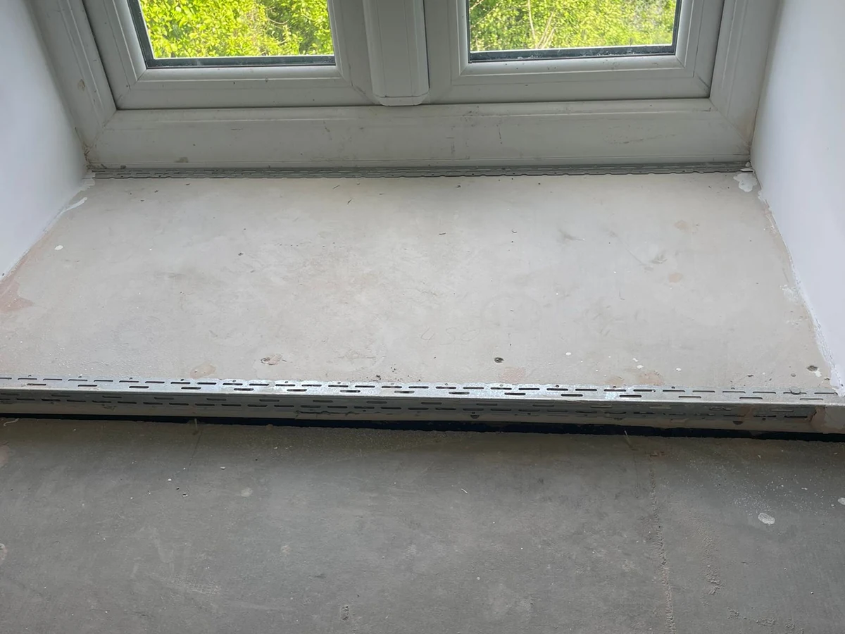 Timber-framed access hatch cut into plasterboard during home renovation in Swansea by Daffodil Carpentry