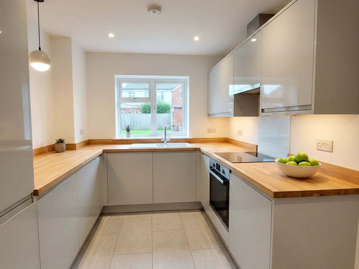 kitchen-fitters-grey-handleless-timber-worktop-pendant-lights-swansea-daffodil-carpentry kitchen fitters grey handleless timber worktop pendant lights swansea daffodil carpentry