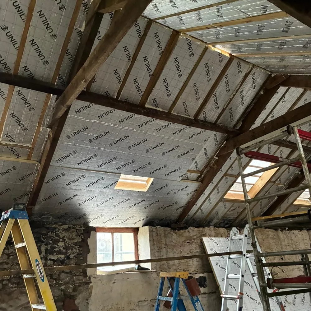loft-insulation-boarding-swansea-daffodil-carpentry Insulation boards fitted between the new timbers, Swansea