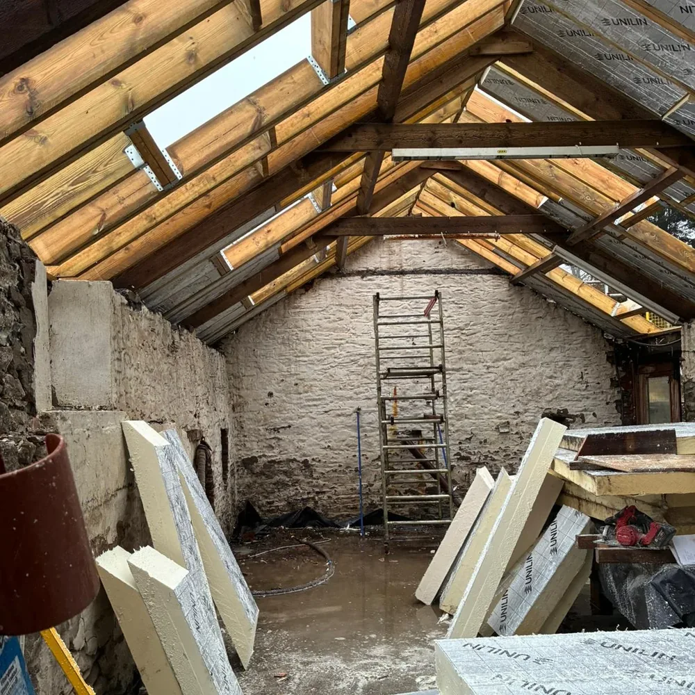 roof-carpentry-barn-conversion-swansea-daffodil-carpentry New rafters going up over the original stone walls, Swansea