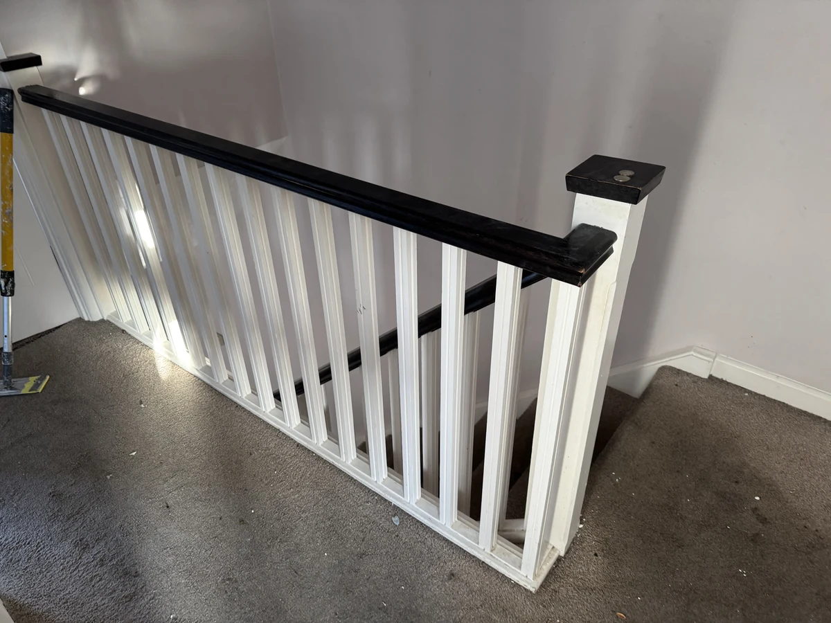 staircase white spindles black handrail landing view swansea daffodil carpentry