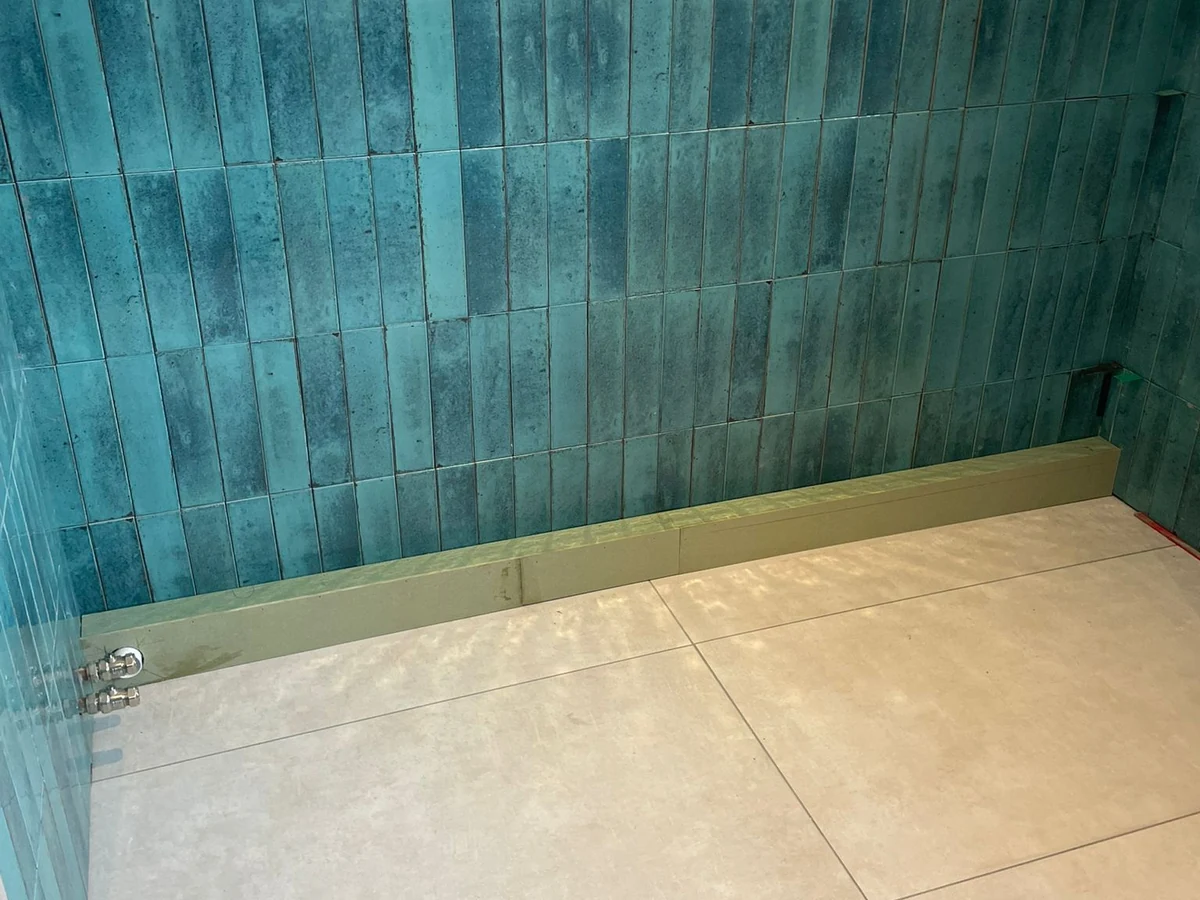 tiling-teal-metro-tiles-shower-with-linear-drain-swansea-daffodil-carpentry Teal metro tiled shower with linear drain installed in Swansea by Daffodil Carpentry shower installation specialists